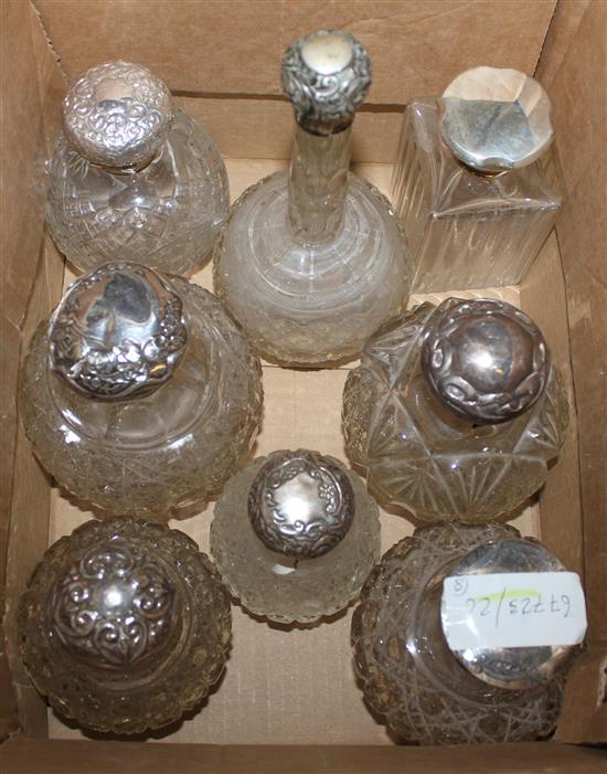 8 silver topped scent bottles